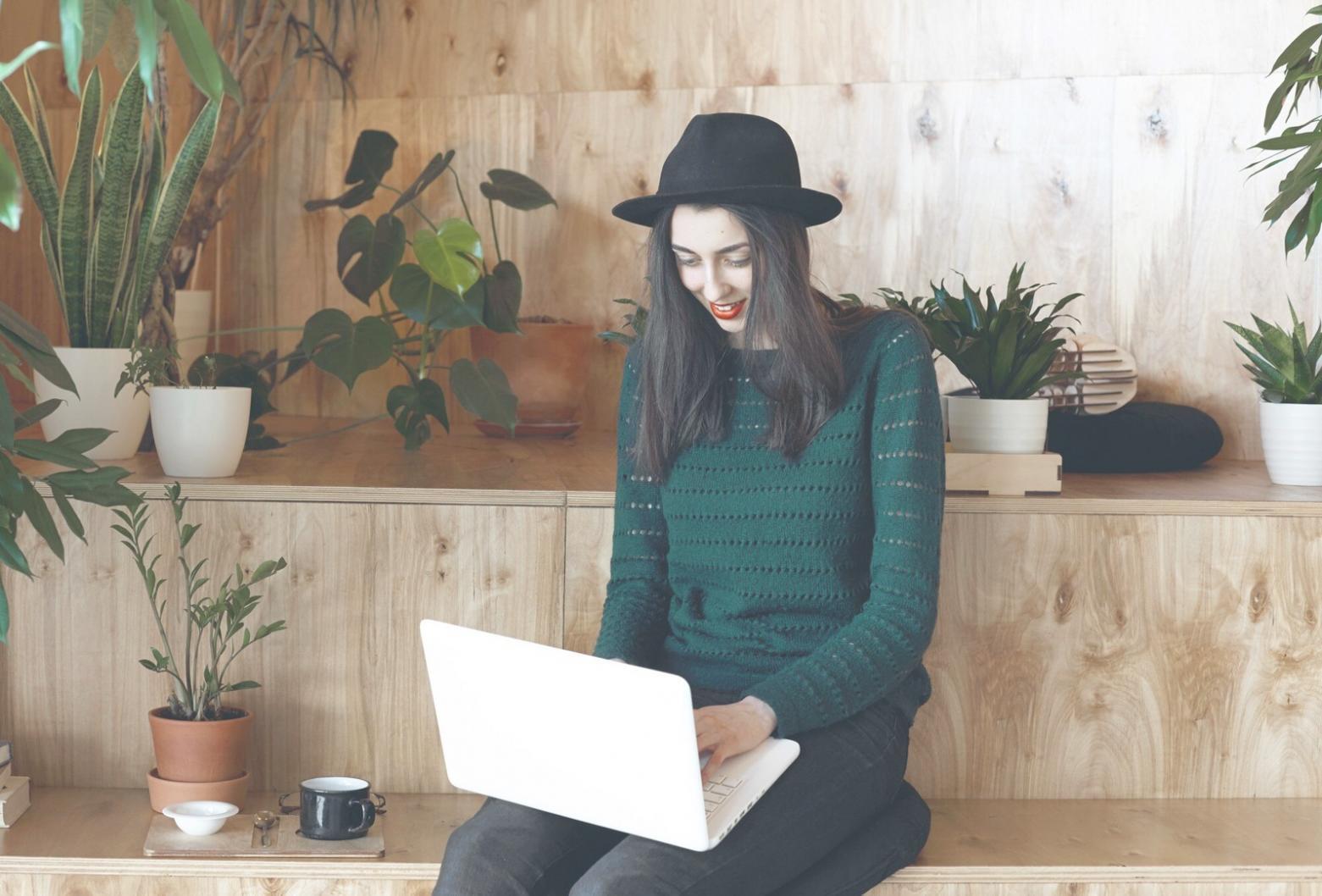 Person using smartphone for mobile banking and budget tracking